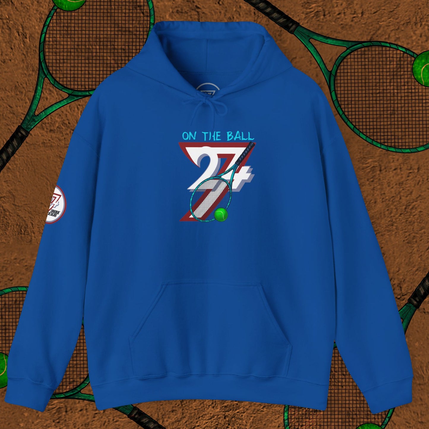 Blue tennis hoodie with hand-drawn tennis gear design and "On The Ball" text, unisex casual sportwear.