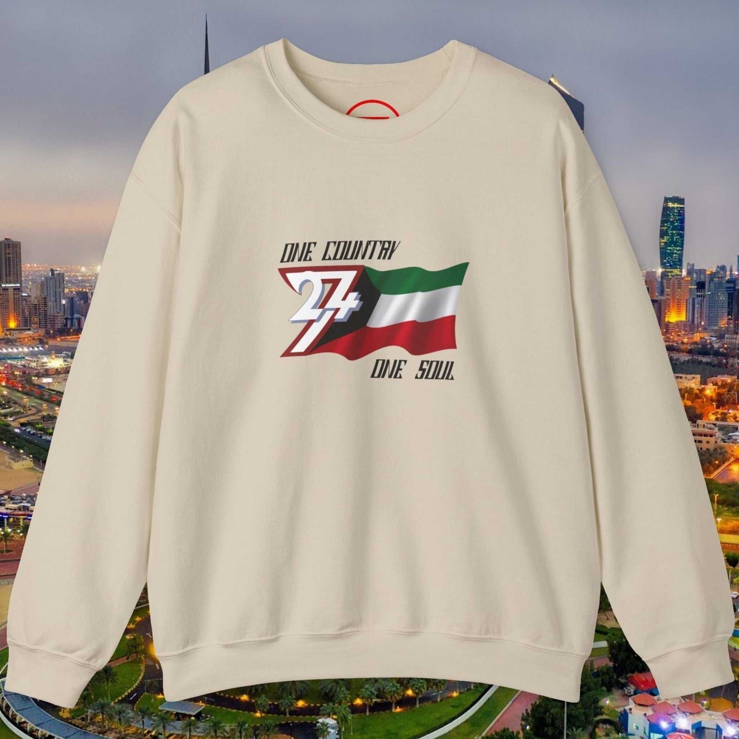 Cream crewneck jumper featuring a vibrant hand-drawn Kuwait flag illustration with "One Country One Soul" text, cotton-poly blend fabric.