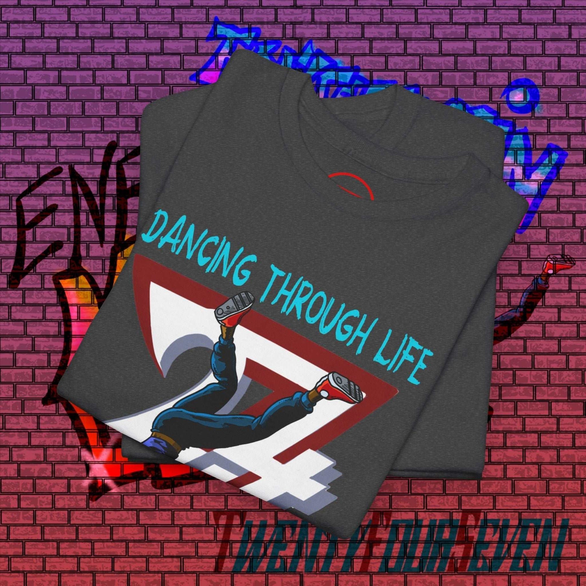 Dance Graphic T-Shirt with hand-drawn urban dance illustration and "Dancing Through Life" text on dark gray fabric