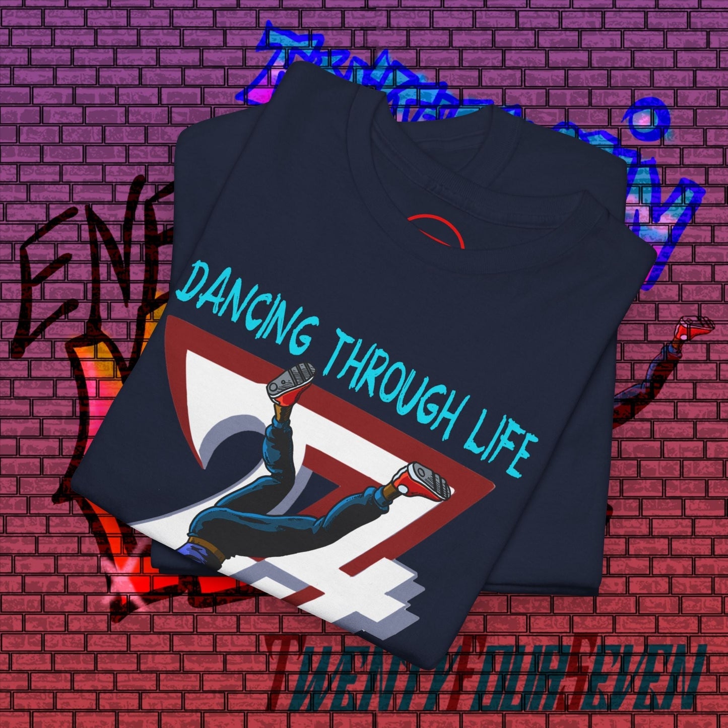 Dance graphic t-shirt with hand-drawn urban dance illustration and "Dancing Through Life" text on navy fabric