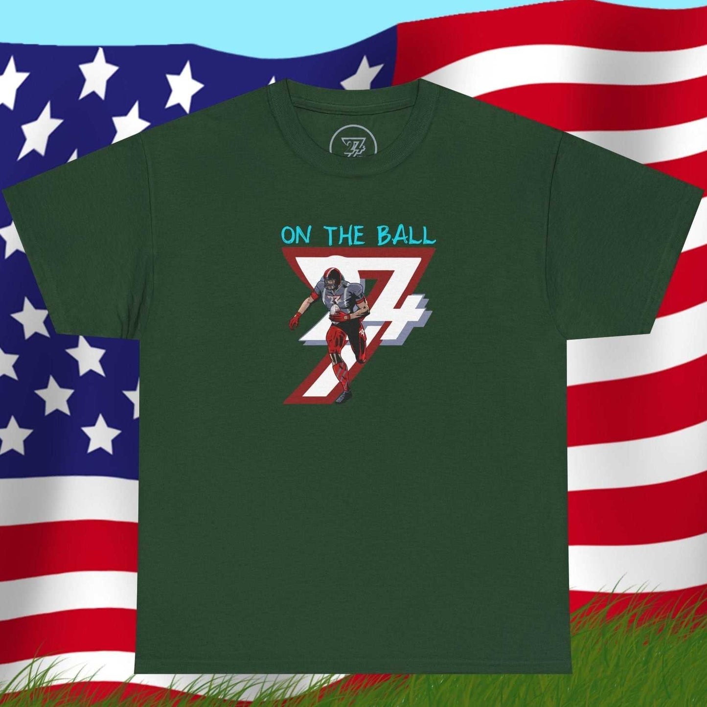 Dark green American football tee with hand-drawn comic-style player graphic and "On The Ball" text, displayed on American flag background