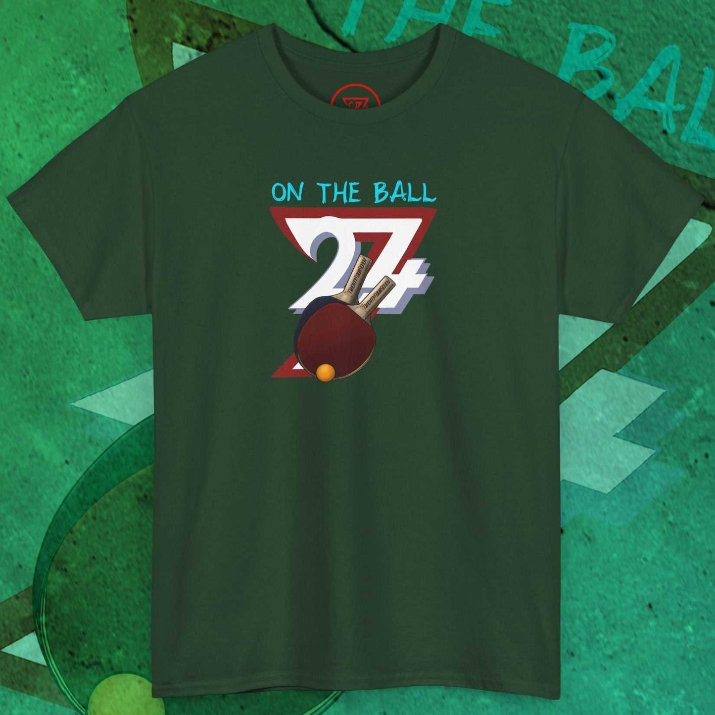 Dark green table tennis t-shirt with hand-drawn ping pong graphic and "On The Ball" text in 90s style