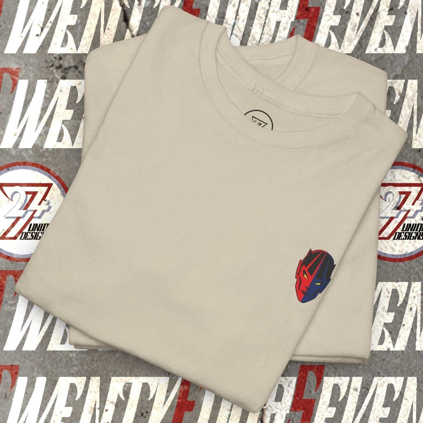 Folded beige bodybuilding tee with small red and blue comic-style gym character graphic front pocket design