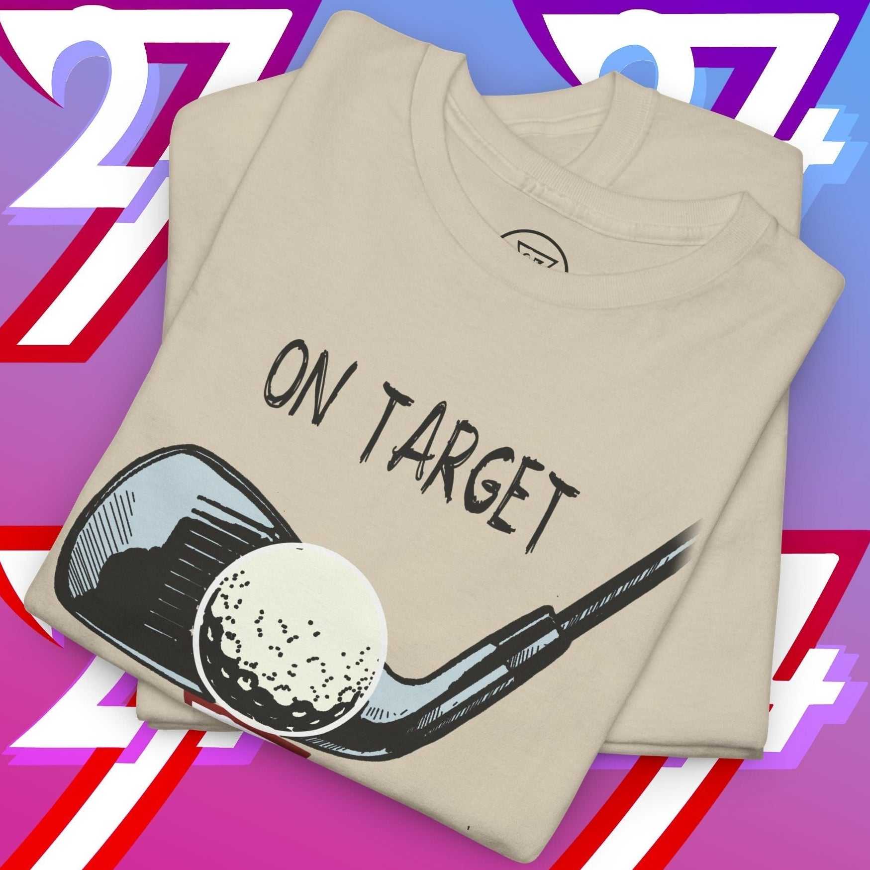 Folded beige golf graphic t-shirt with hand-drawn golf club and ball illustration and "ON TARGET" text on front