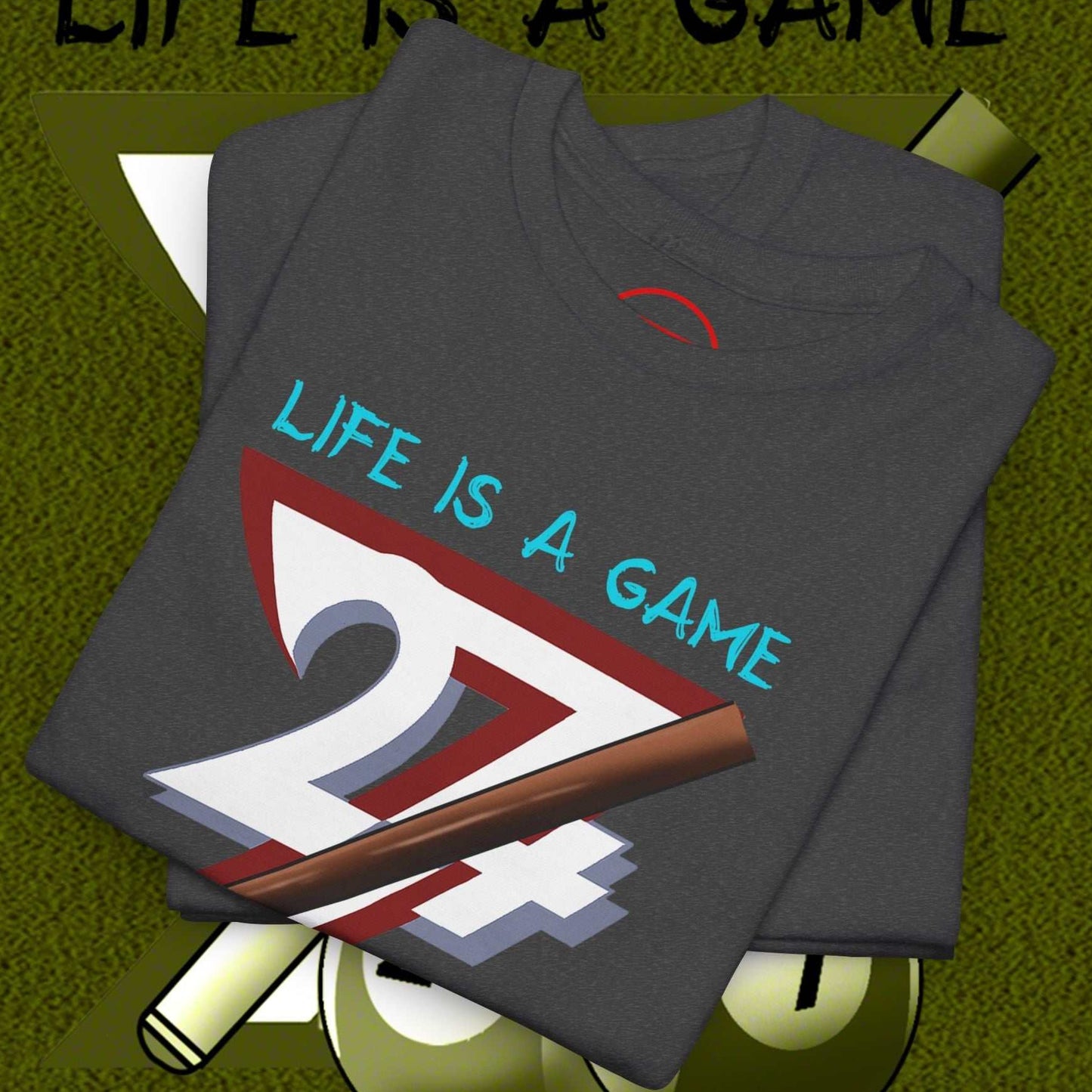 Folded dark billiards tee with "Life is a Game" and pool ball graphic, illustrated design on soft cotton fabric
