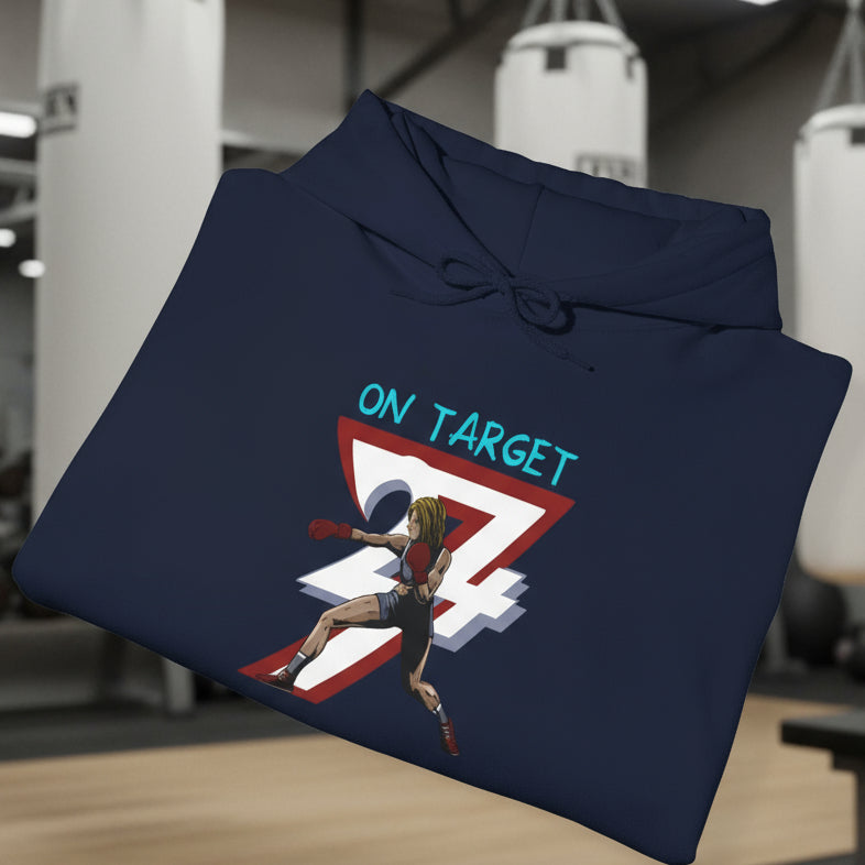 Folded navy blue women's boxing hoodie with feminine boxer illustration and "ON TARGET 24/7" design on front