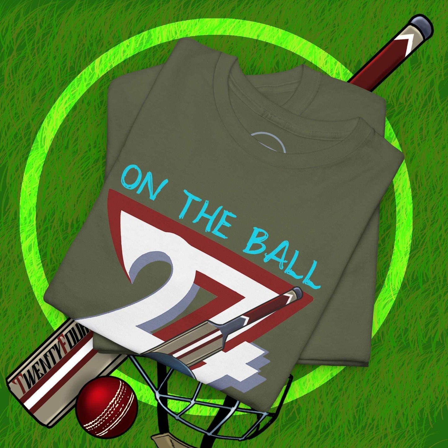 Folded olive green cricket tee with hand-drawn vintage cricket motif, cricket bat, ball, and helmet on grass background