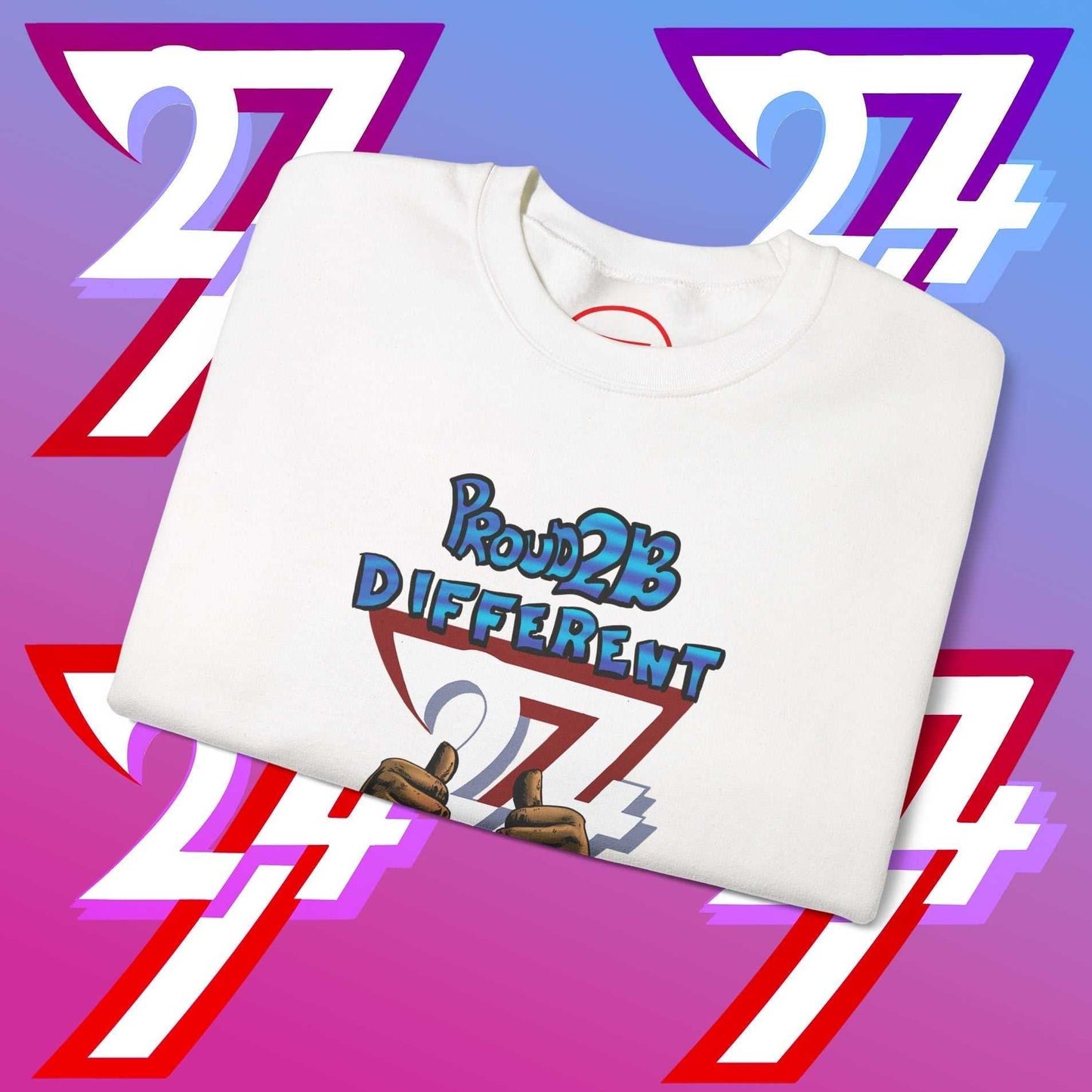 Folded white artistic sweatshirt with "Proud 2 B Different" slogan and hand-drawn graphic on purple and pink gradient background