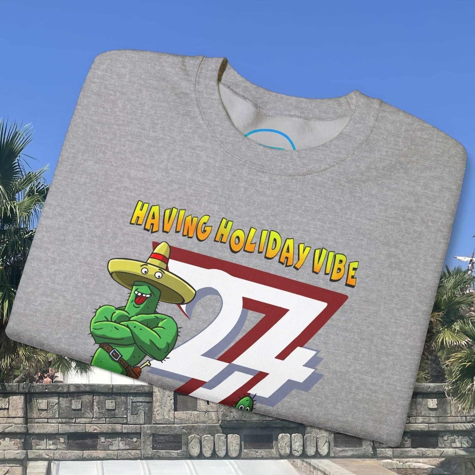 Funny Cactus Crewneck Sweatshirt with cartoon cactus and "Having Holiday Vibe" text on gray fabric