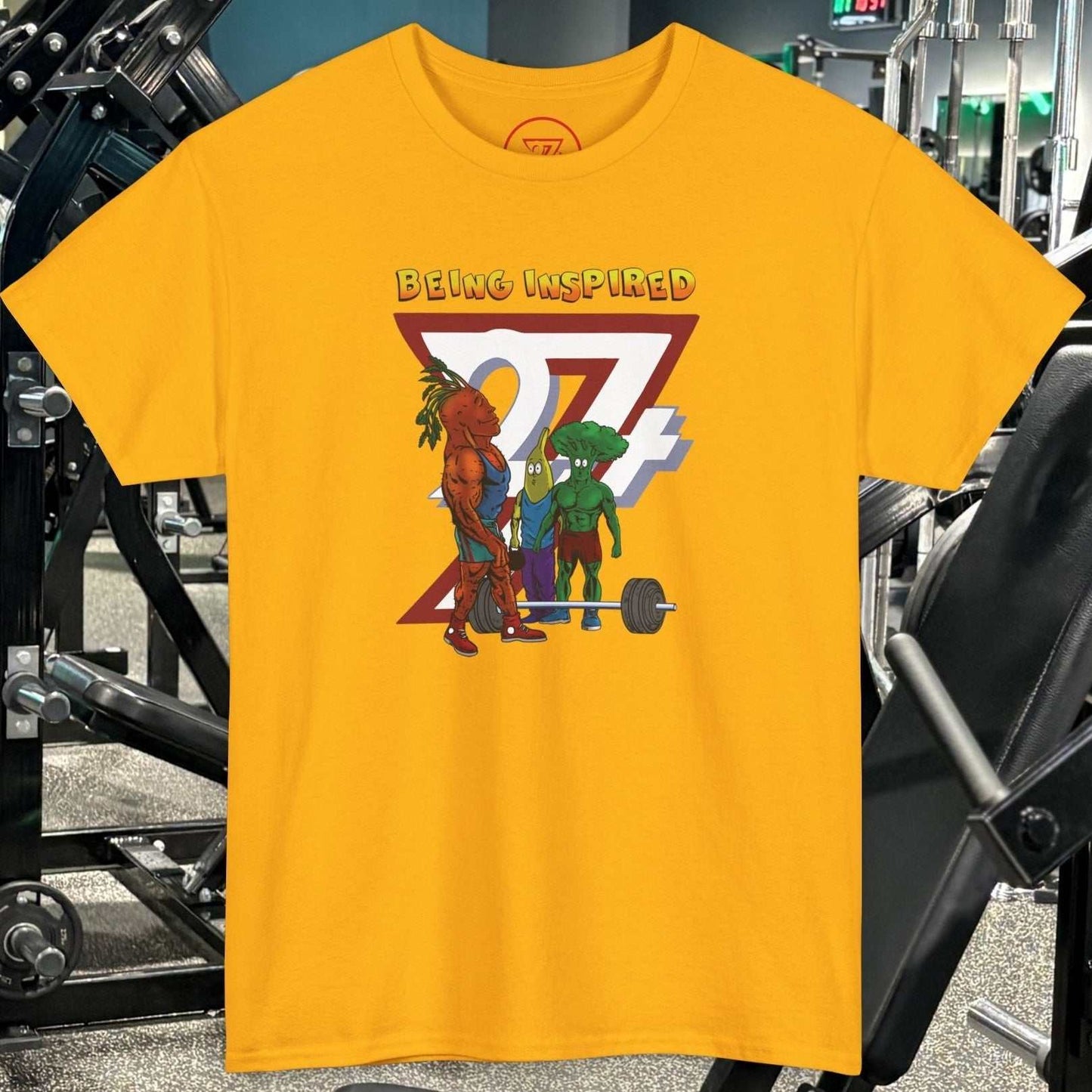 Funny Carrot Gym Tee with cartoon vegetables lifting weights on yellow cotton shirt in gym setting