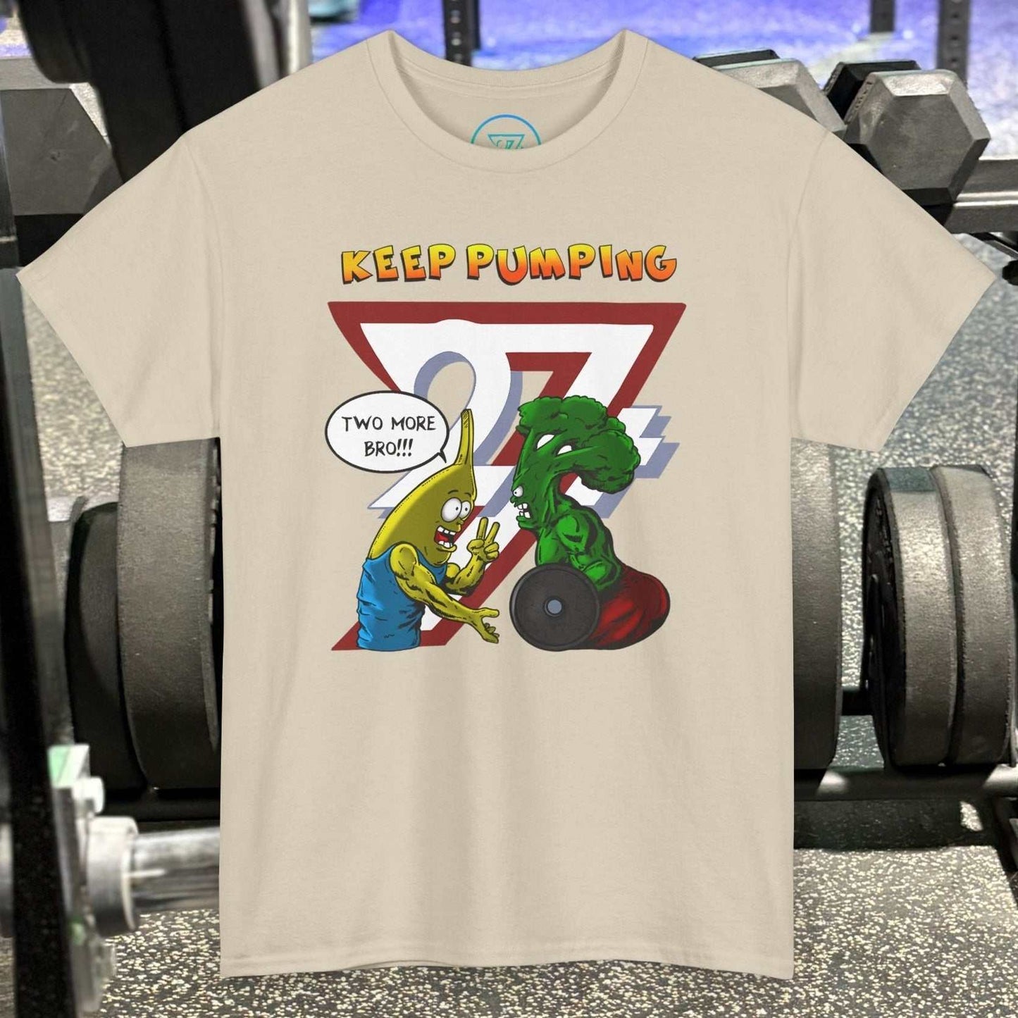 Funny broccoli gym tee with cartoon broccoli and banana lifting weights and "Keep Pumping" text