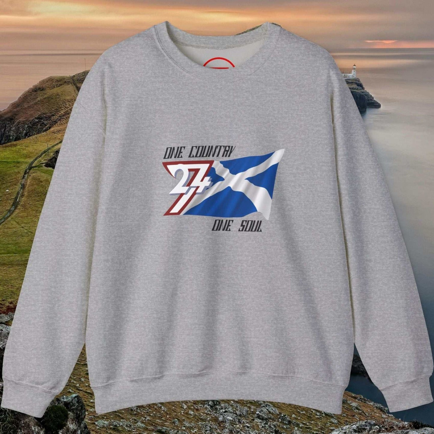 Gray Scotland Saltire crewneck sweatshirt with hand-drawn St. Andrew’s Cross and "One Country One Soul" text, medium-heavy cotton-poly blend, ribbed collar and cuffs.