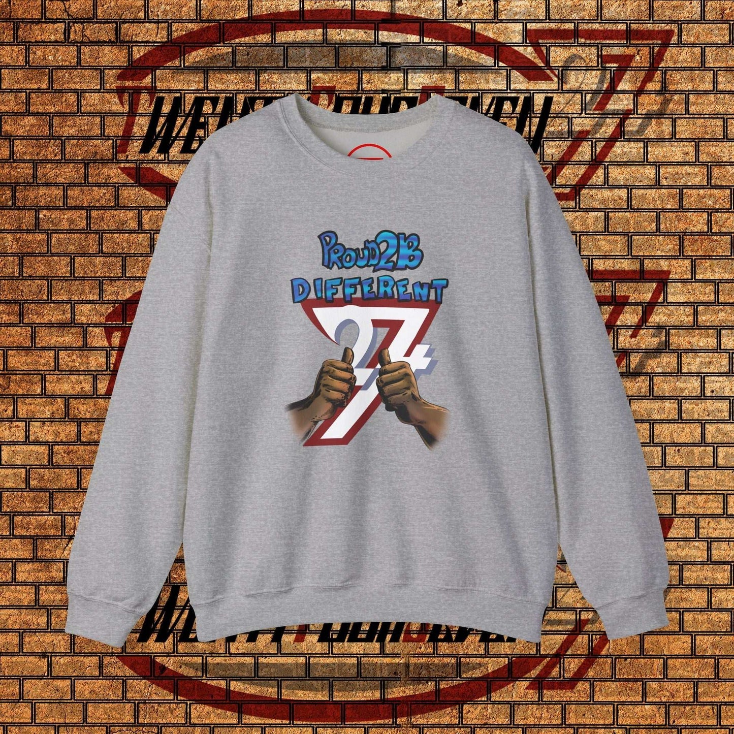 Gray artistic sweatshirt with "Proud 2 B Different" slogan and hand-drawn graphic, crewneck style