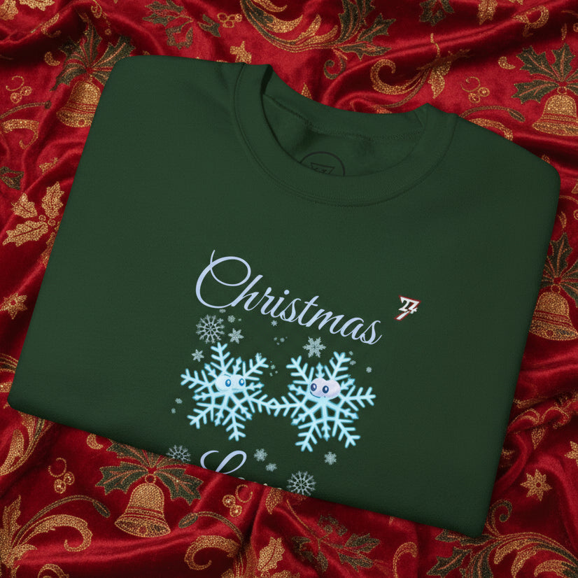 Green Christmas sweatshirt with cute snowflakes holding hands design on red festive fabric background