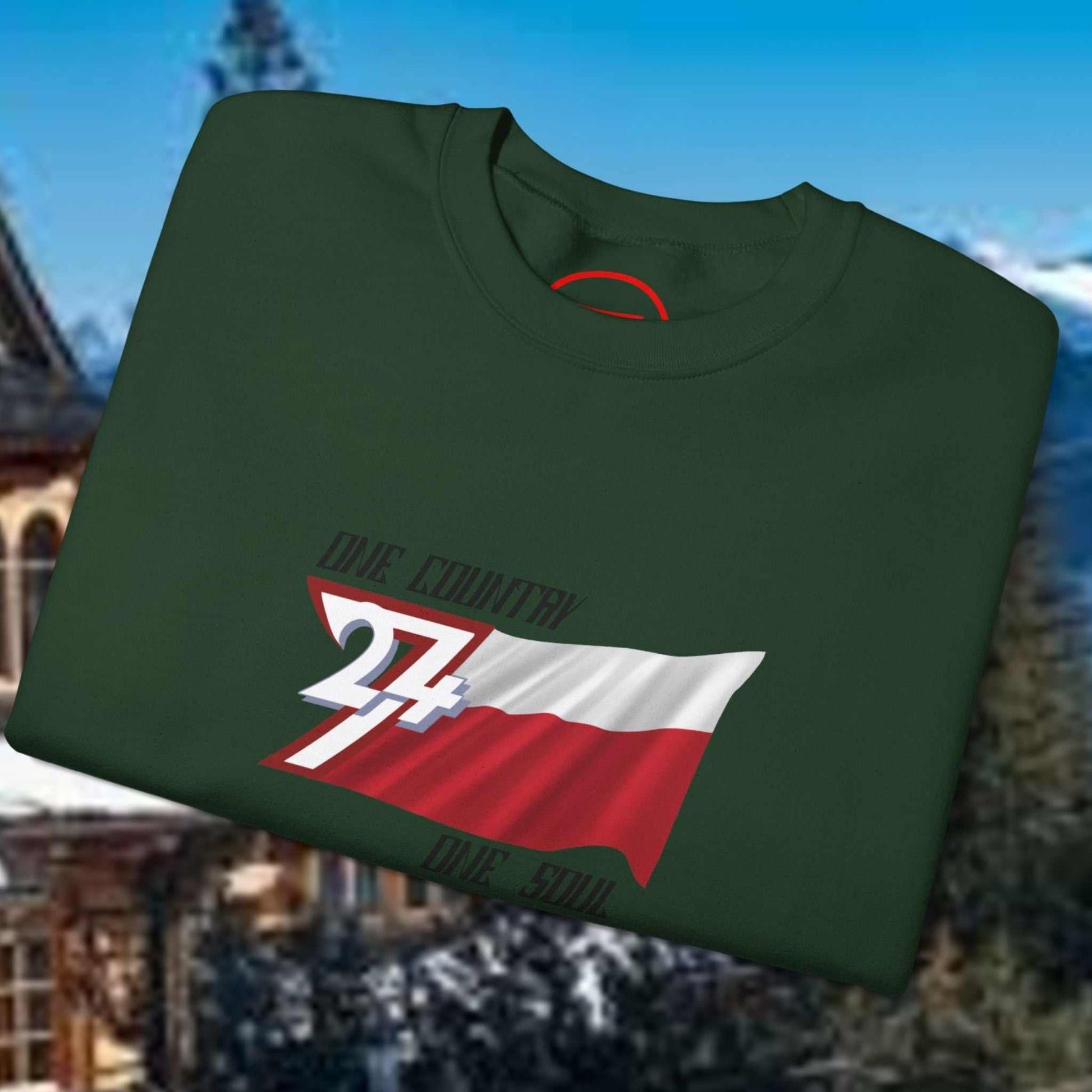 Green Poland jumper with hand-drawn white and red Polish flag and "one country one soul" text on chest