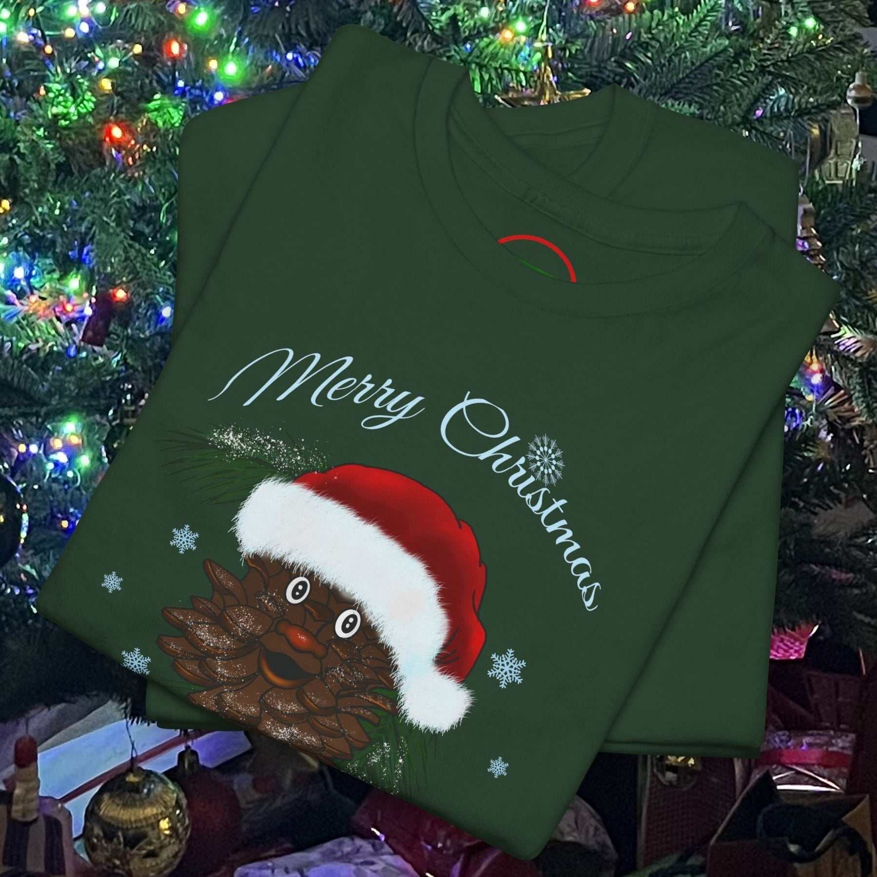 Green Santa Pinecone Tee with cartoon pinecone wearing Santa hat and Merry Christmas text against festive lights background