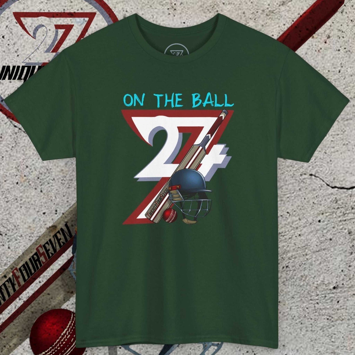 Green cricket tee with hand-drawn vintage cricket motif and "On The Ball 24/7" text, 90s retro sports design