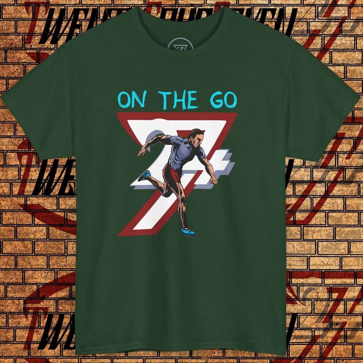 Green running T-shirt with hand-drawn comic-style runner graphic and "ON THE GO" text, lightweight cotton activewear for training and lifestyle.