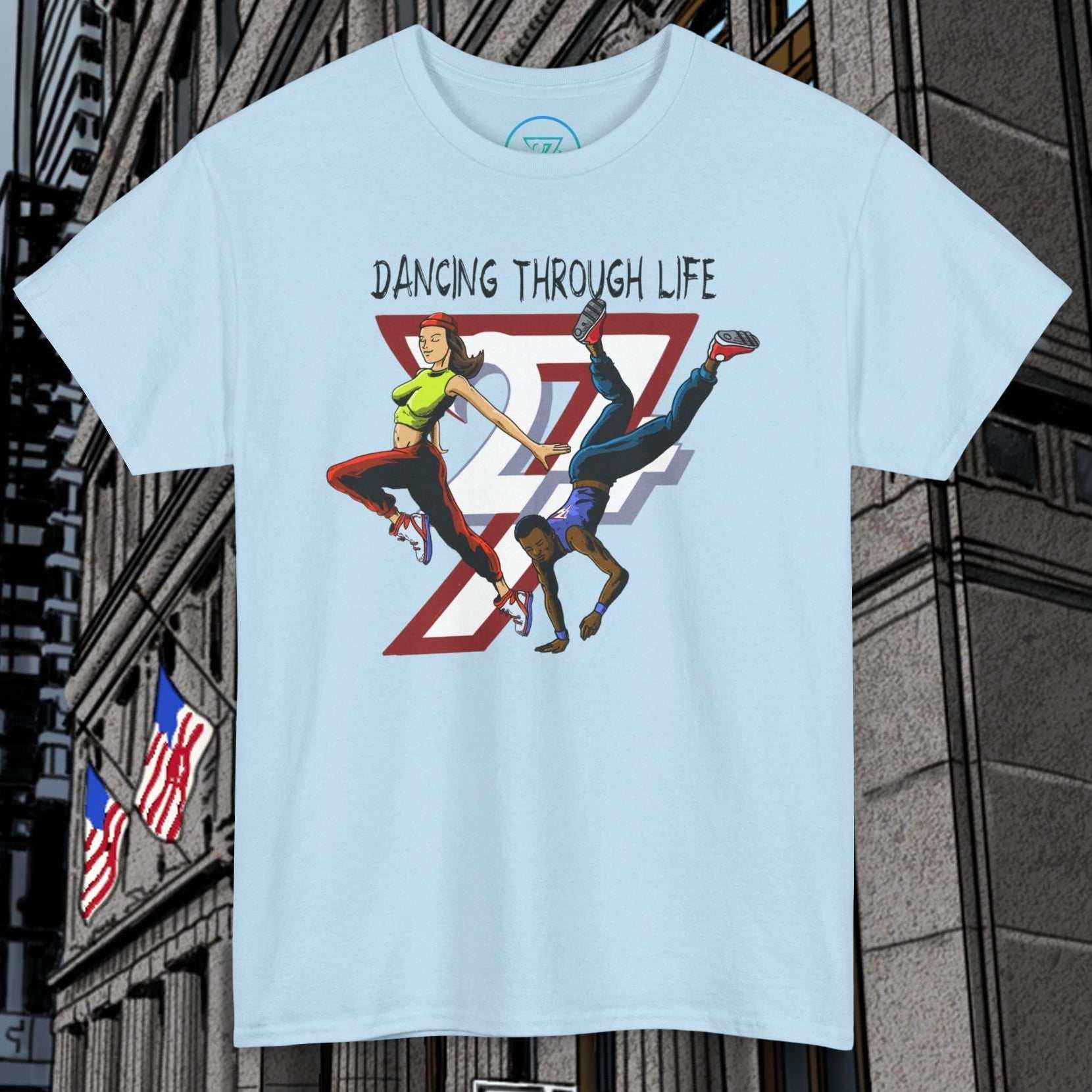 Light blue Street Dance Comic Art T-Shirt with urban hip-hop dancers graphic and "Dancing Through Life" text