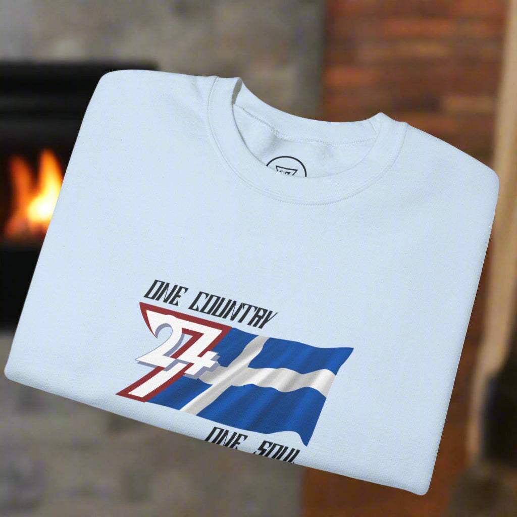 Light blue jumper with Finnish flag on chest