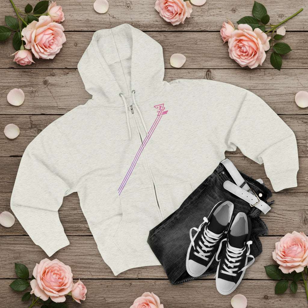 Light gray women's zip hoodie with pink stripes, styled with black jeans and black sneakers, casual streetwear look