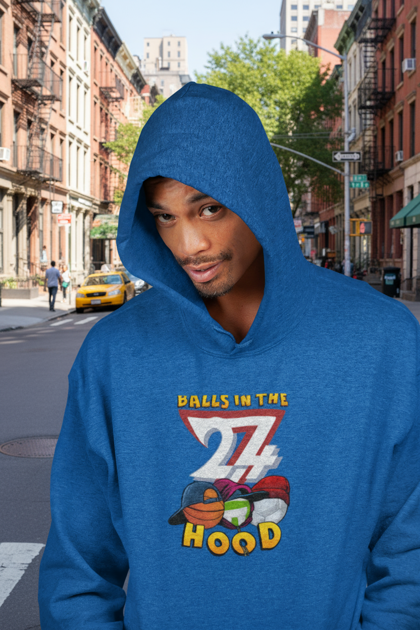Man wearing blue printed hoodie with "Balls in the Hood" design, urban streetwear for ballgames and city nights
