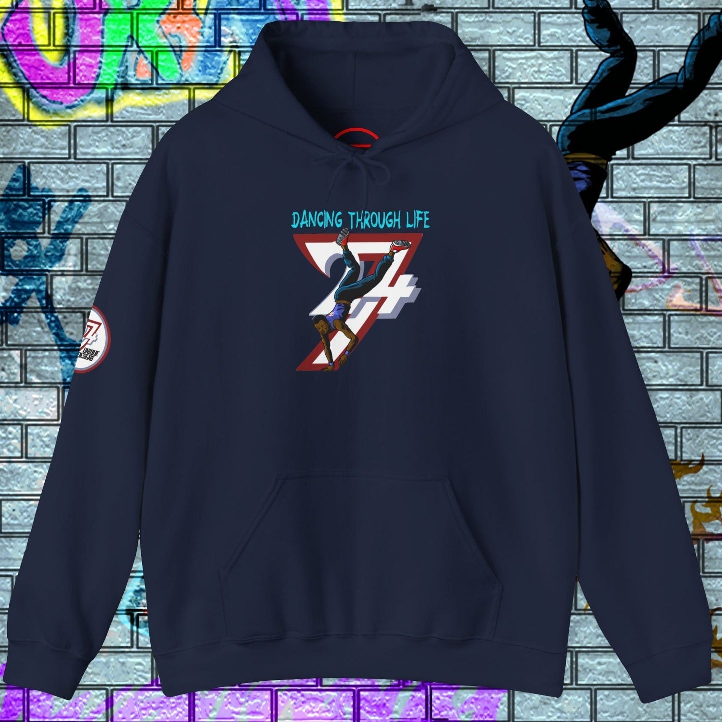 Men's navy street dance hoodie with hand-drawn dancer design and kangaroo pocket against graffiti wall background