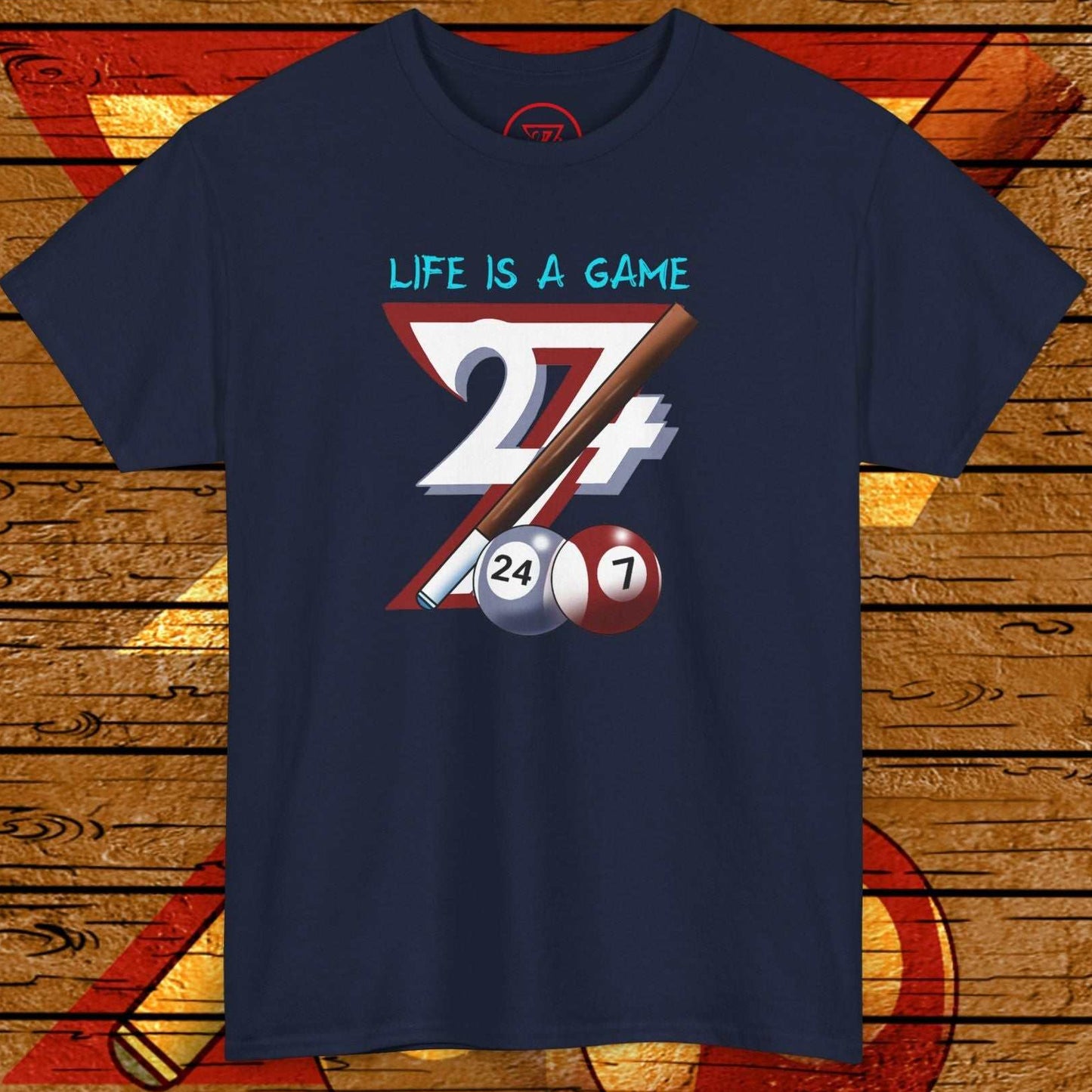 Navy billiards tee with hand-drawn pool cues, balls, and "Life is a Game" text, perfect for pool game fans.