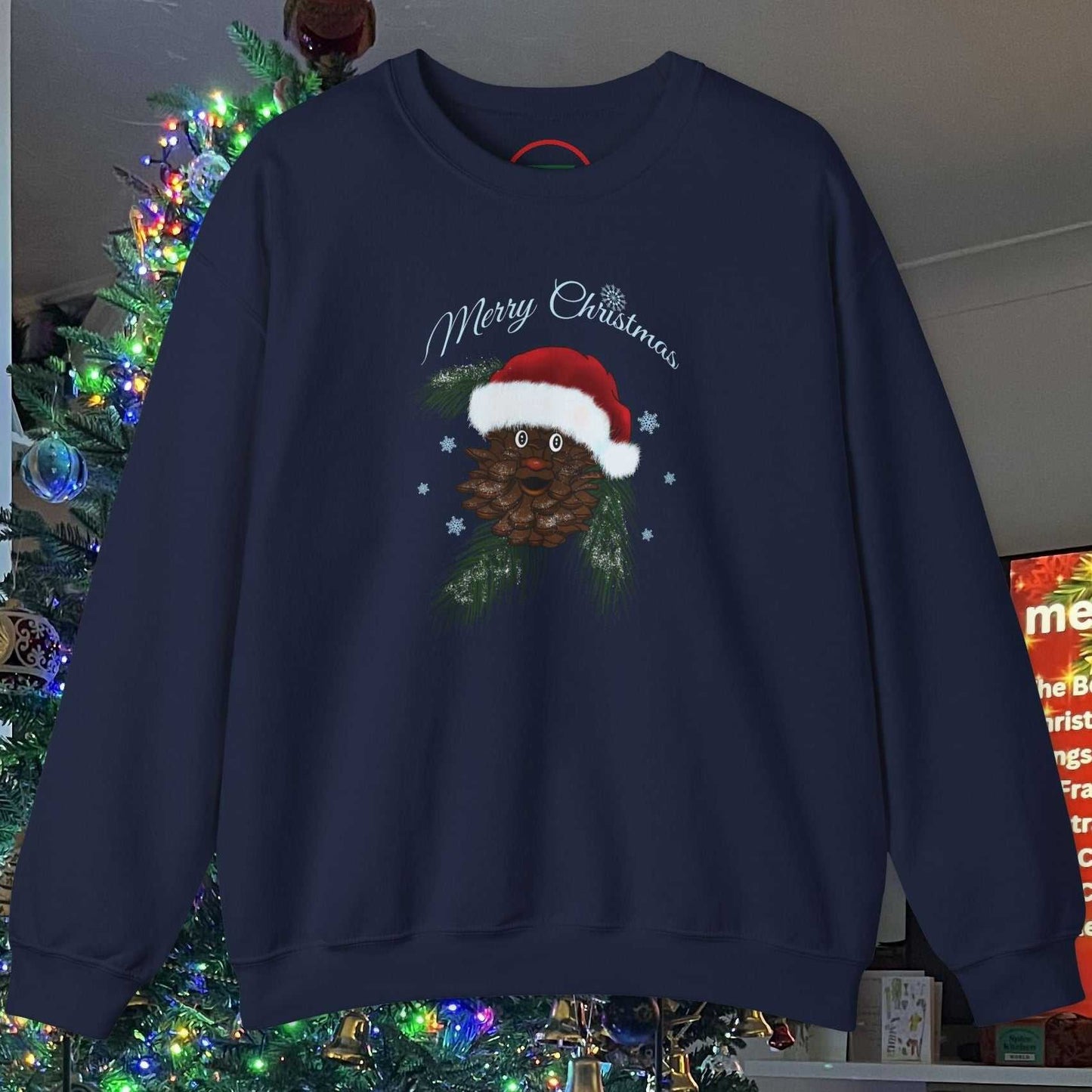 Navy blue Santa Pinecone Christmas sweatshirt with hand-drawn pinecone wearing Santa hat and "Merry Christmas" text, festive winter design