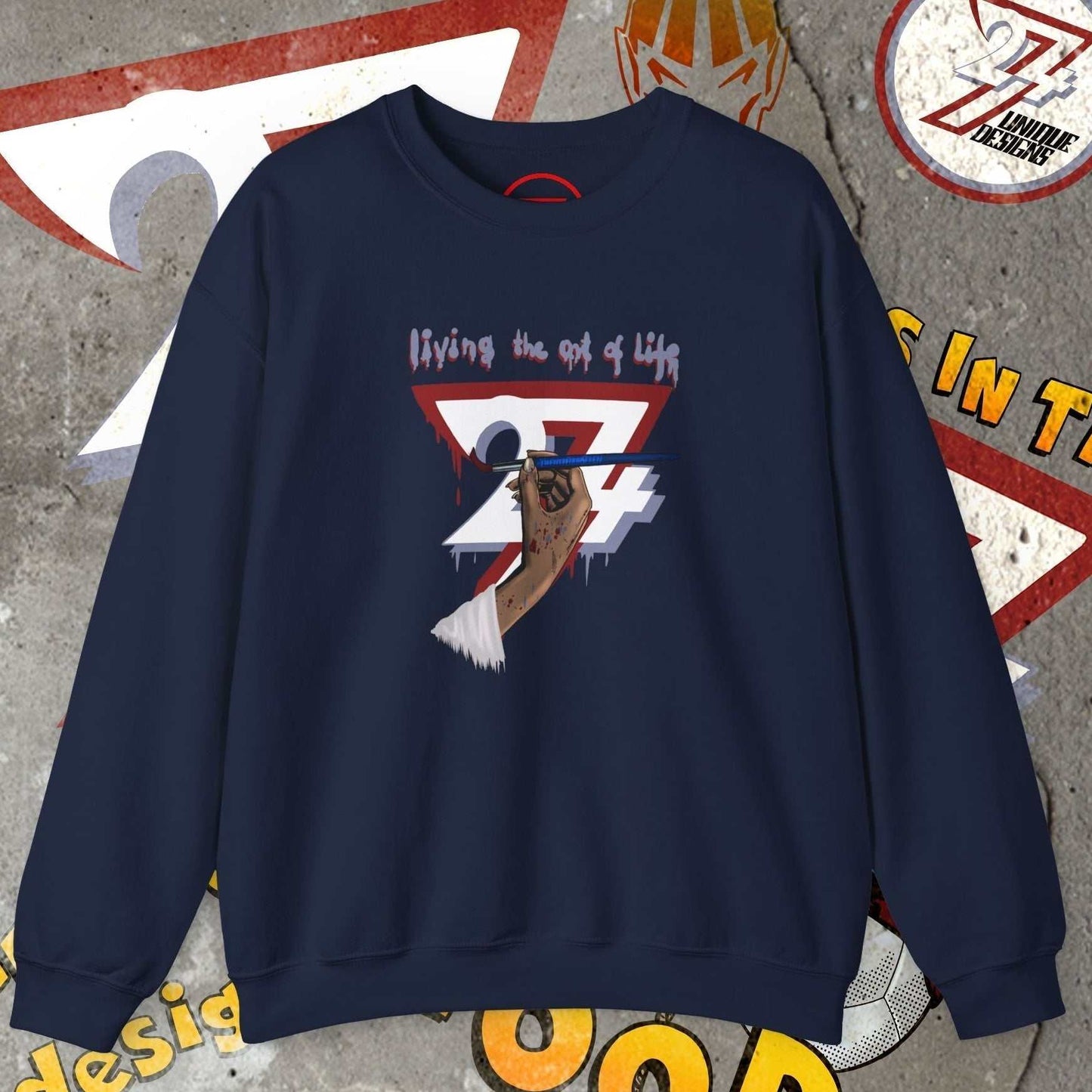 Navy blue artist brush sweatshirt with hand-drawn bohemian design and "living the art of life" text on front