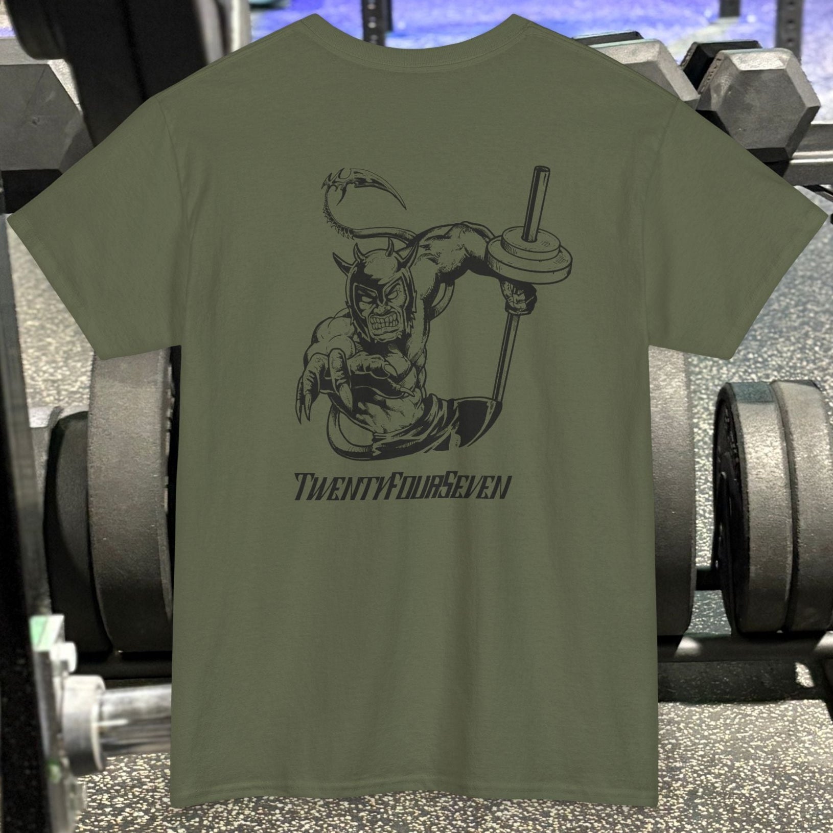 Olive green bodybuilding tee with comic-style hand-drawn muscular character lifting weights graphic on the back.