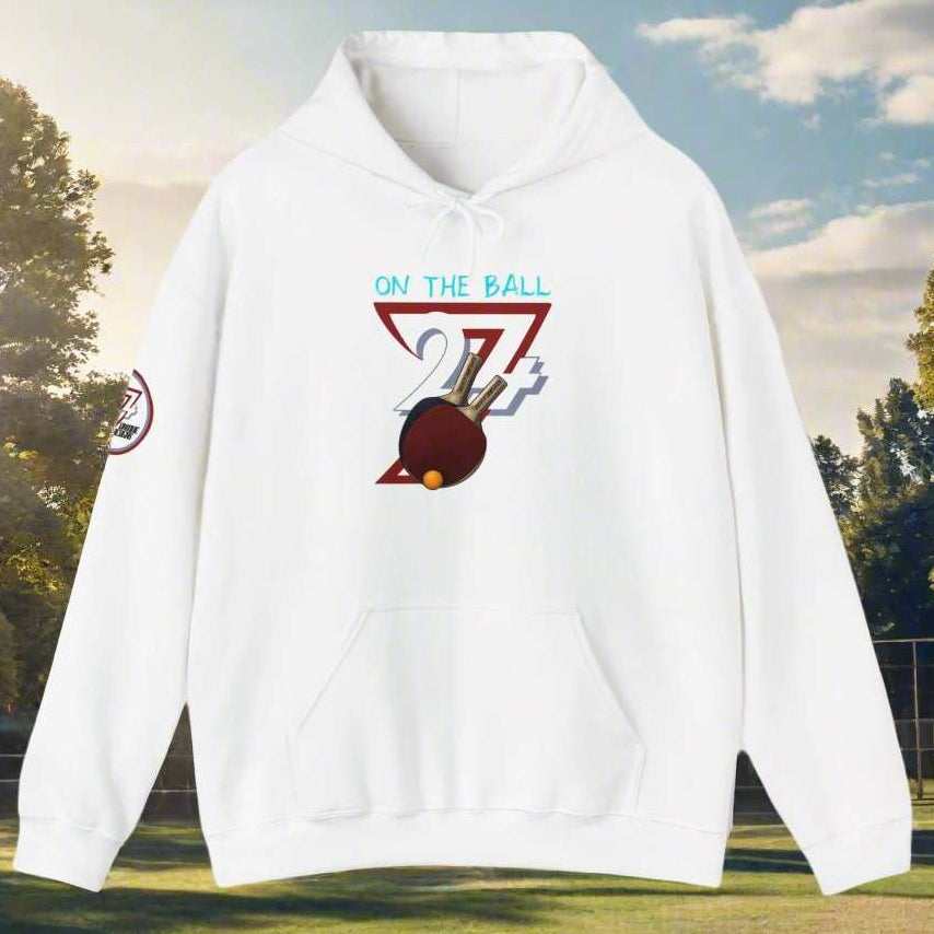 White ping pong hoodie with hand-drawn paddle design and adjustable hood, comfortable for indoor and outdoor sports.