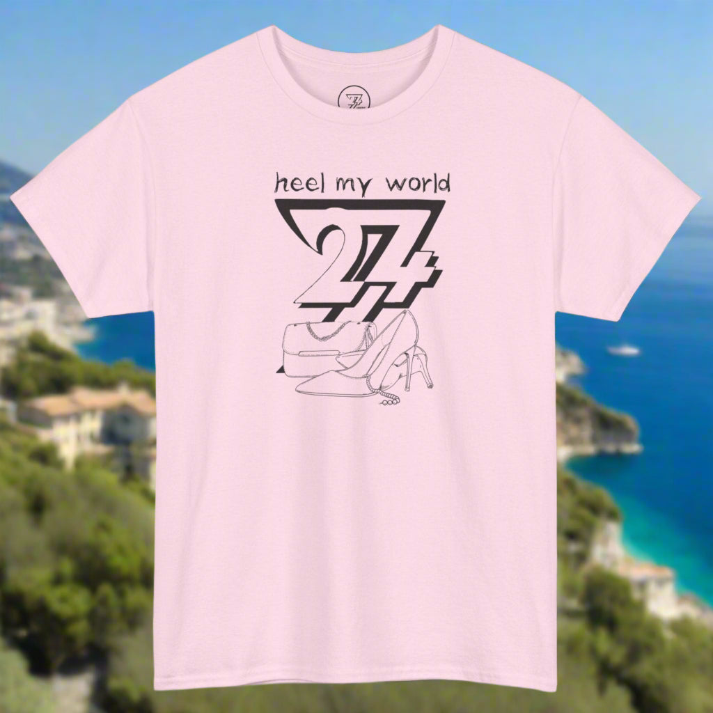 Pink graphic tee with black outline high heel shoe and handbag illustration and "heel my world" quote