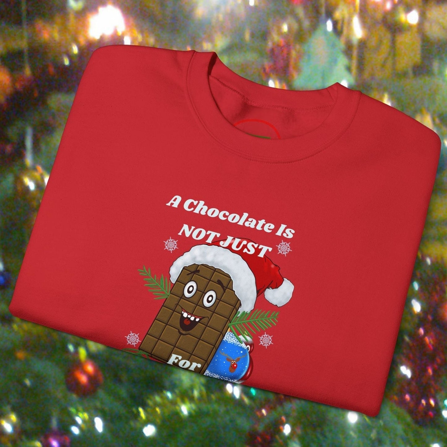 Red Christmas chocolate sweatshirt with funny cartoon chocolate bar and festive design on blurred holiday lights background