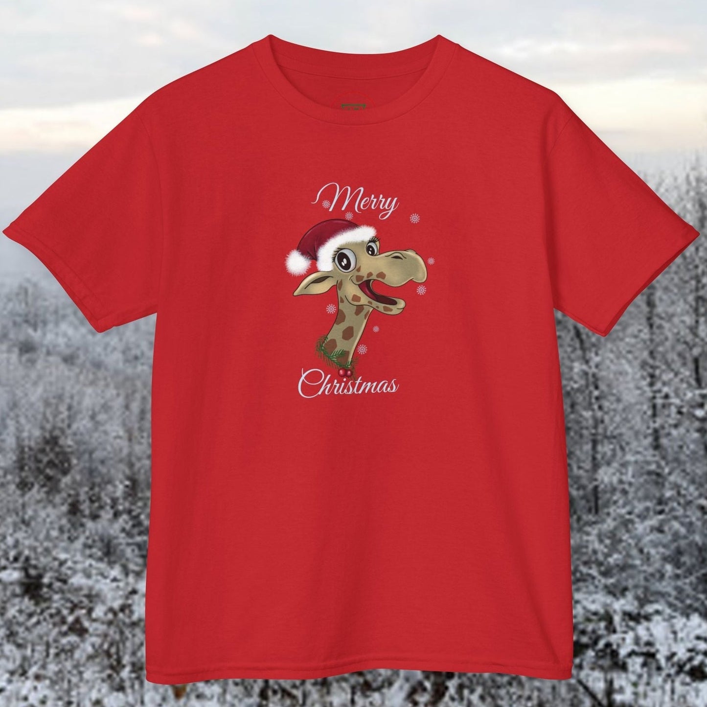 Red Christmas giraffe t-shirt for children with festive cartoon giraffe wearing Santa hat and "Merry Christmas" text