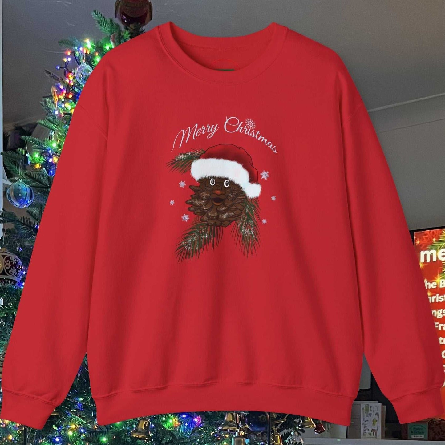 Red Santa Pinecone Christmas sweatshirt with hand-drawn pinecone wearing Santa hat and festive "Merry Christmas" text