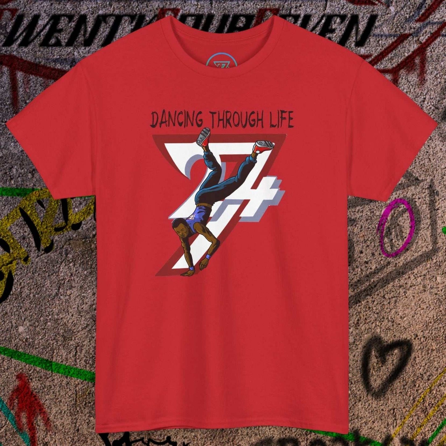 Red hip-hop dance tee with comic-style dancer graphic and "Dancing Through Life" text, urban streetwear design