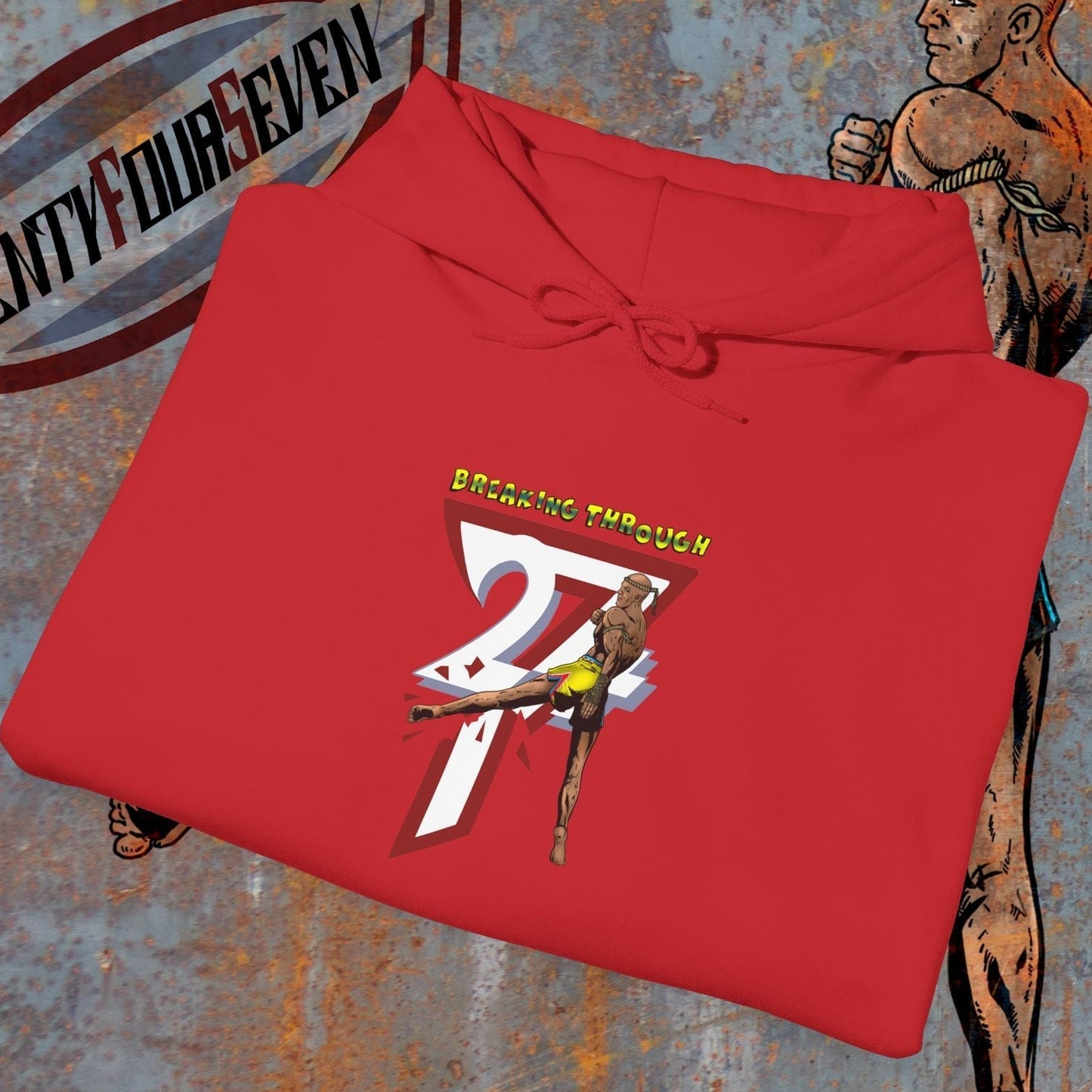 Red muay thai hooded sweatshirt with "Breaking Through 247" graphic and martial artist illustration on textured background