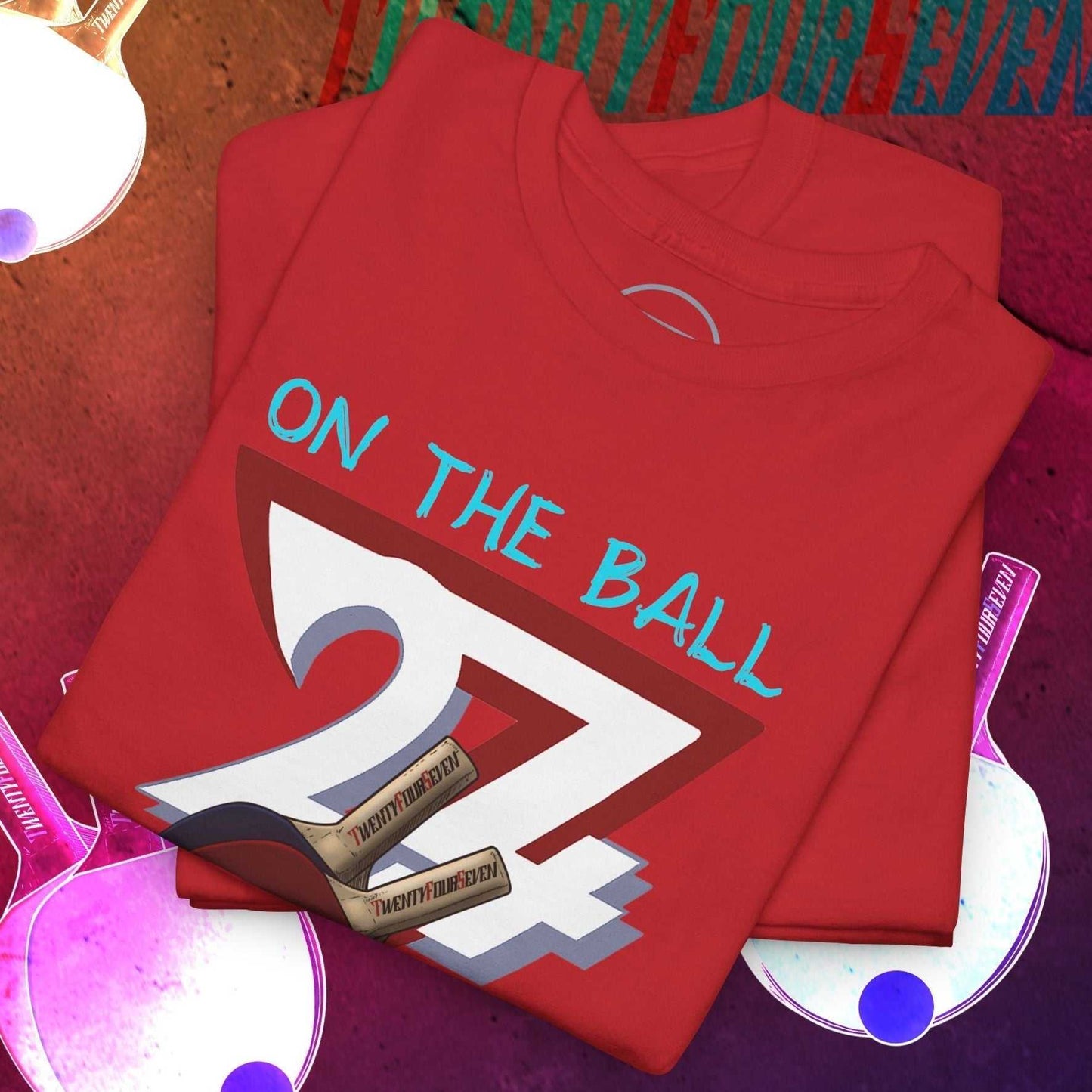 Red ping-pong t-shirt with hand-drawn 24/7 ON THE BALL graphic design