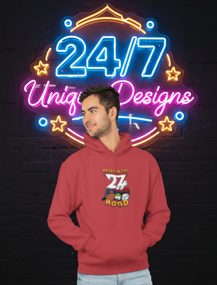 Red printed hoodie with "Balls in the Hood" design, worn by a man, urban streetwear style for ballgames and city nights