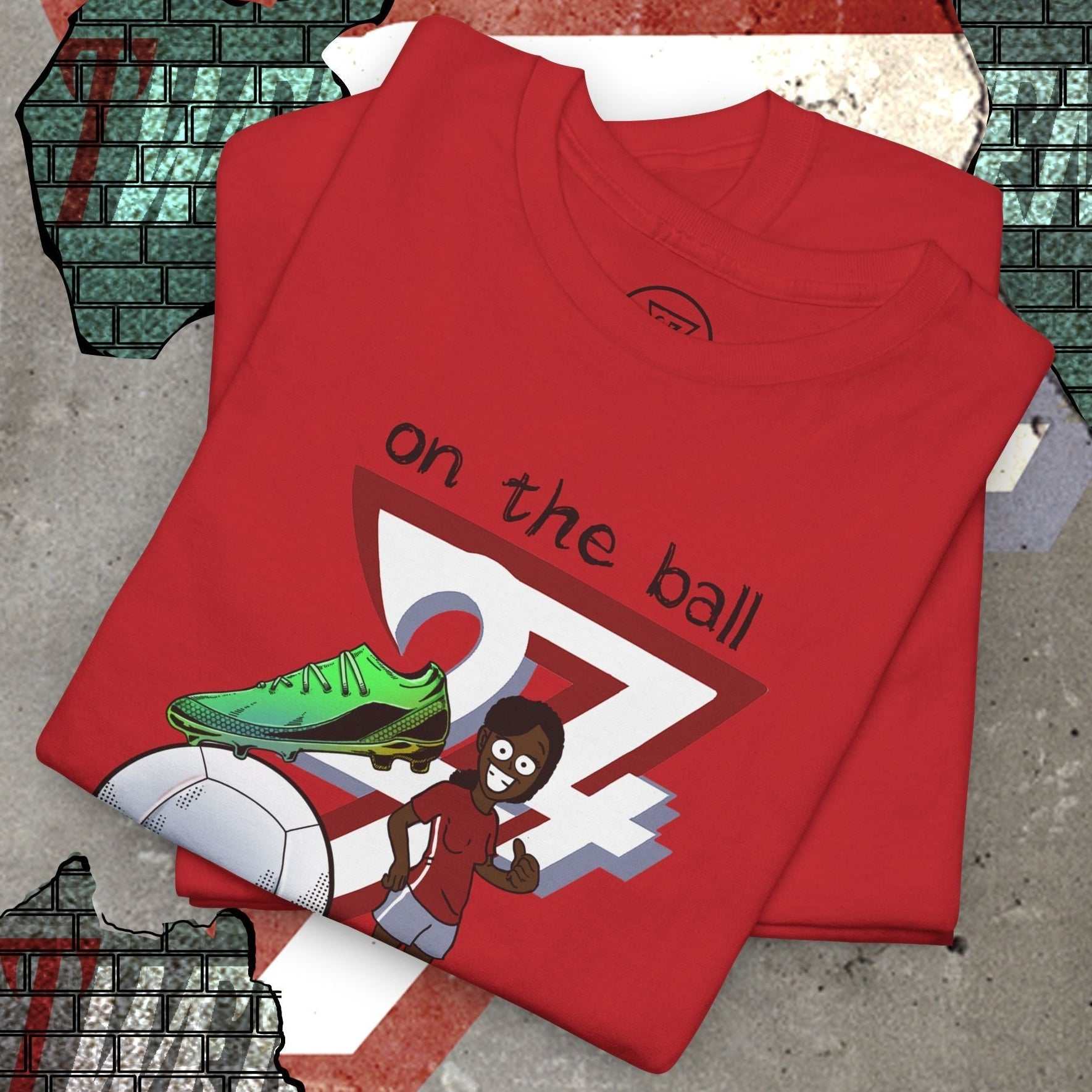 Red women's football boot tee with hand-drawn soccer boot illustration and "on the ball" text design