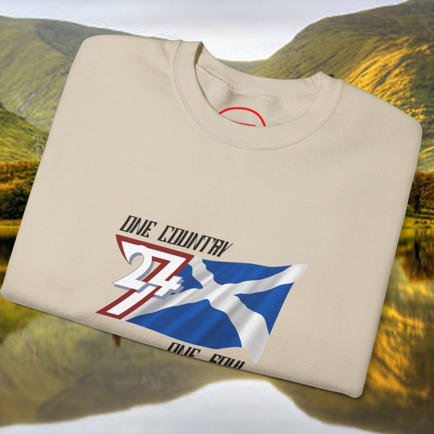 Scotland Saltire crewneck sweatshirt with hand-drawn St. Andrew's Cross and "One Country" text on cream fabric