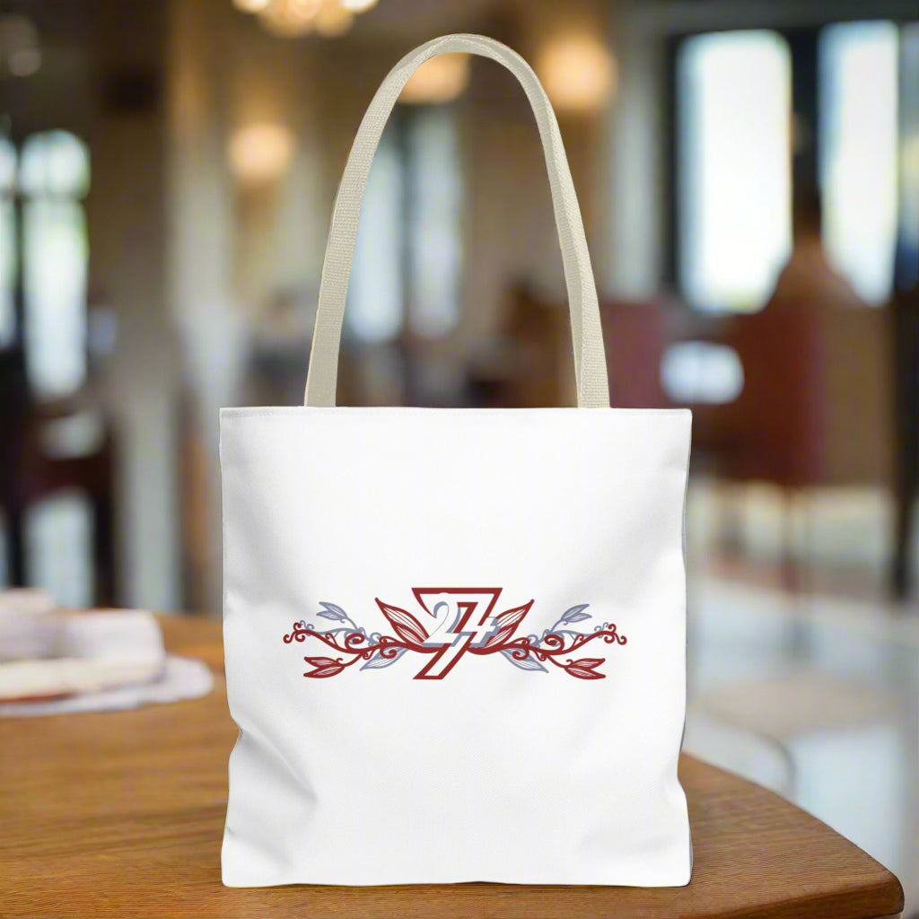 Small tote bag with floral design and beige handle