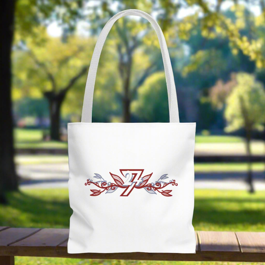 Small white tote bag with white handle and floral design