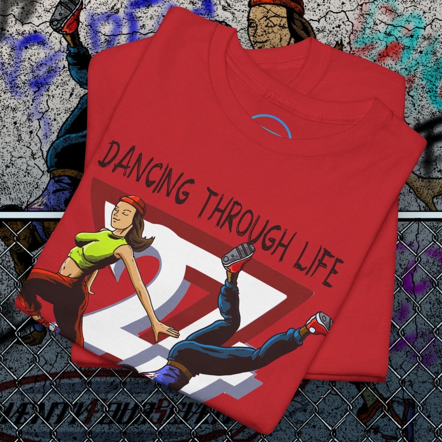 Street Dance Comic Art T-Shirt with vibrant urban hip-hop illustration and "Dancing Through Life" text on red fabric