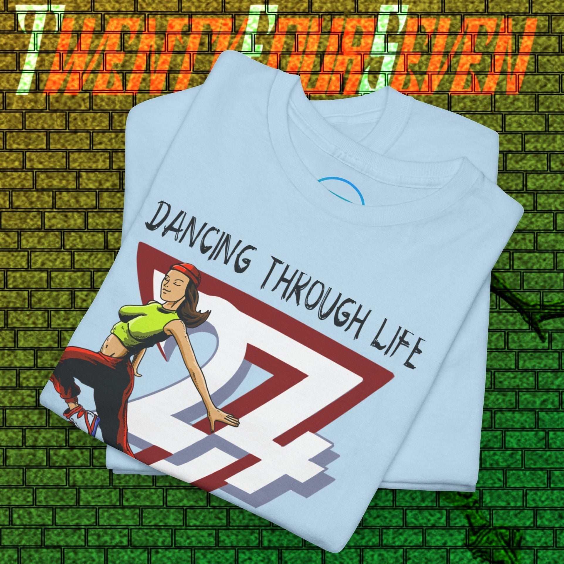 Street Dance Graphic Tee with vibrant hand-drawn urban dancer illustration and "Dancing Through Life" text on light blue fabric