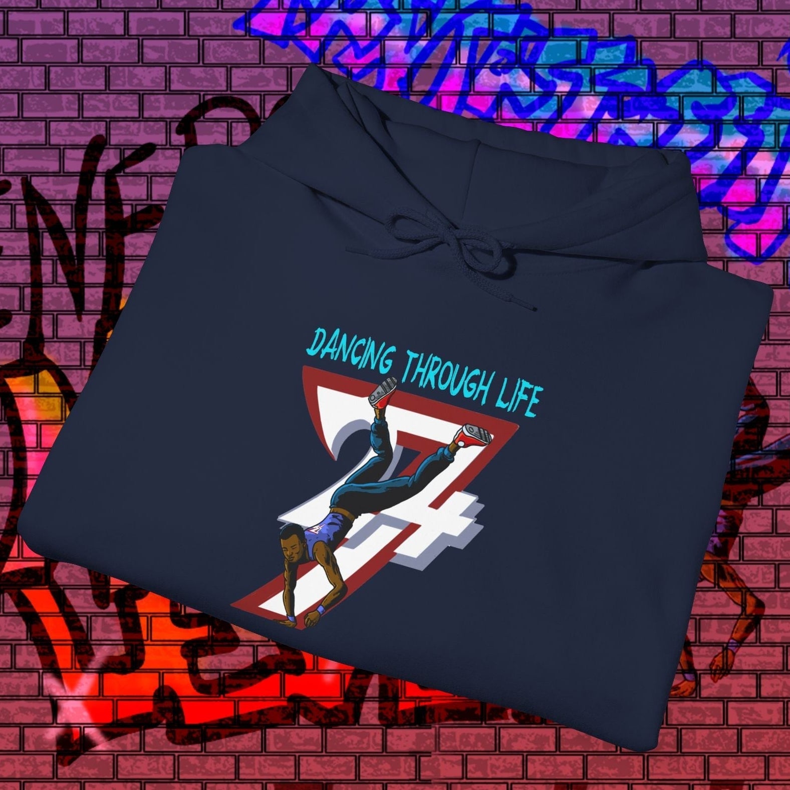 Street dance hoodie for men with cool hand-drawn dancer design and "Dancing Through Life" text on navy blue fabric