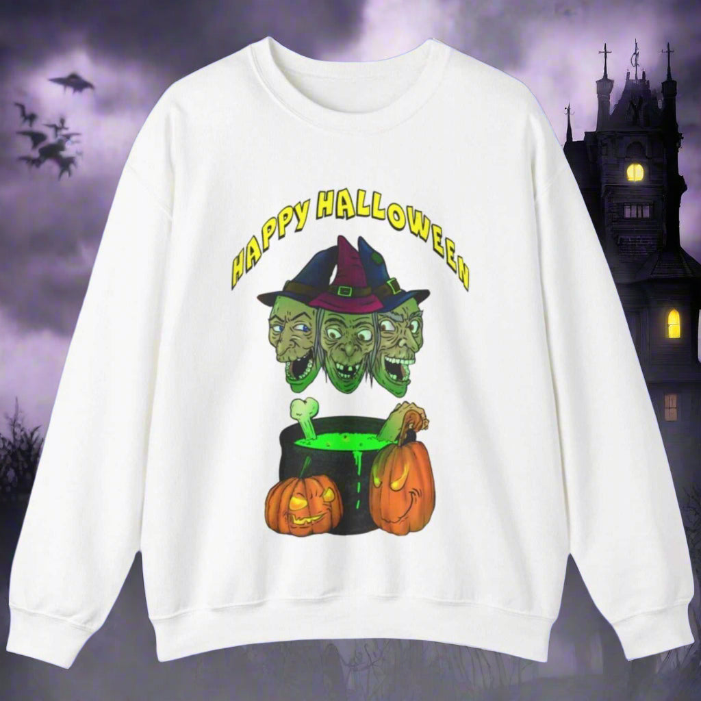 White sweatshirt with Halloween design featuring three witches' heads, a cauldron, and pumpkins with "Happy Halloween" text