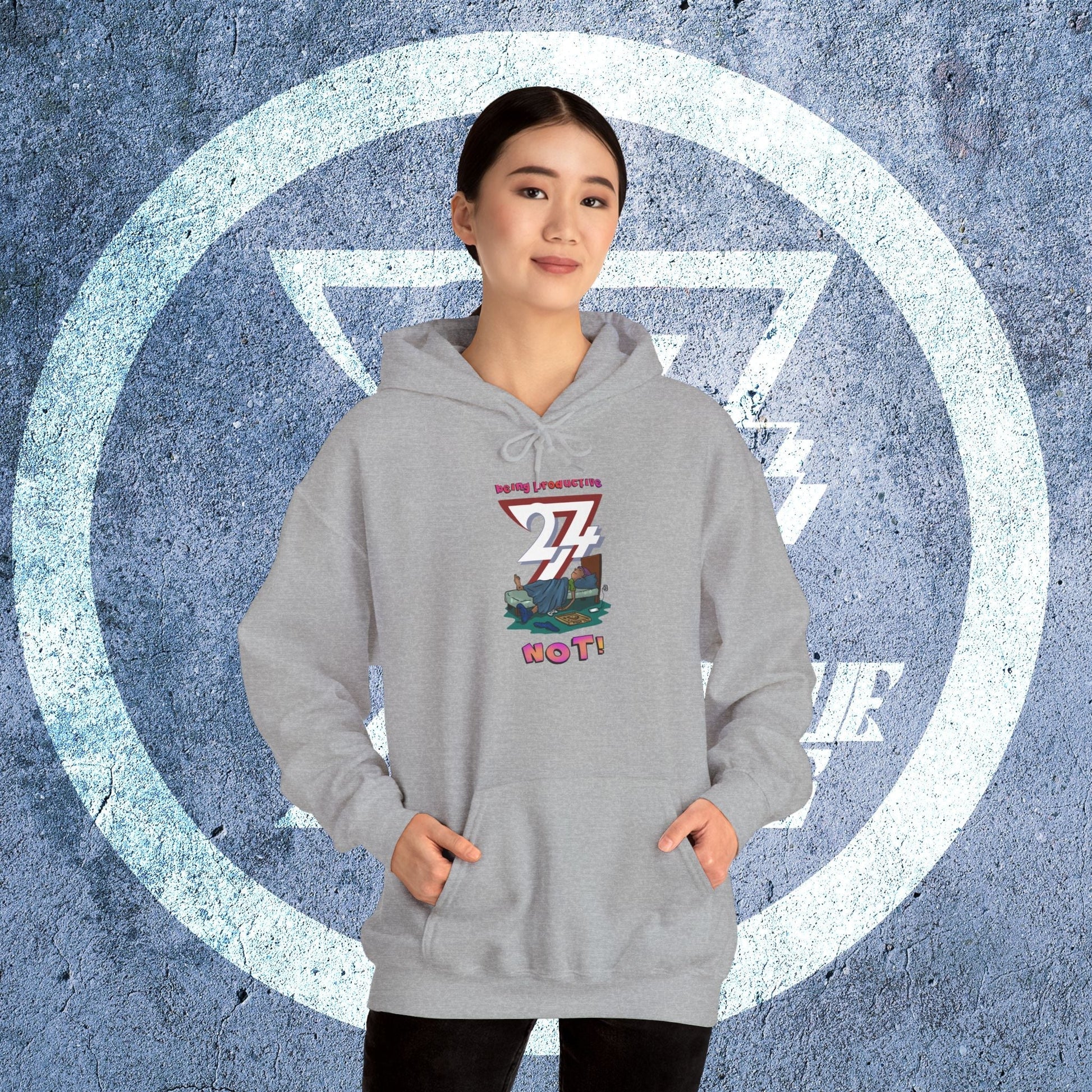 Teen wearing grey funny custom hoodie with cartoon lazy design and kangaroo pocket in front against textured background
