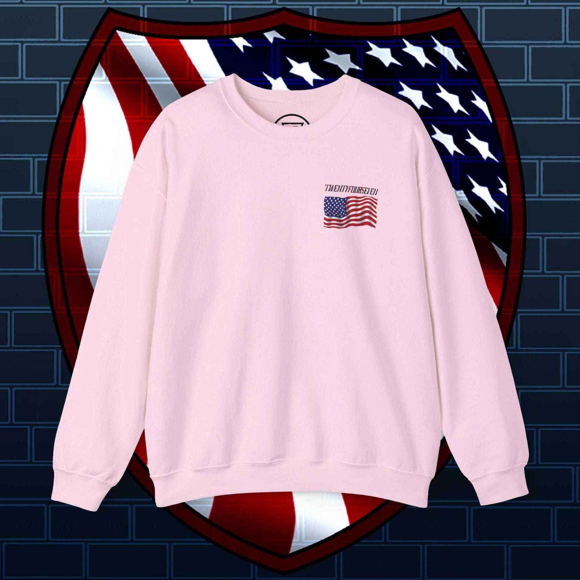 Unisex pink sweatshirt with small hand-drawn American flag logo, cozy and patriotic design